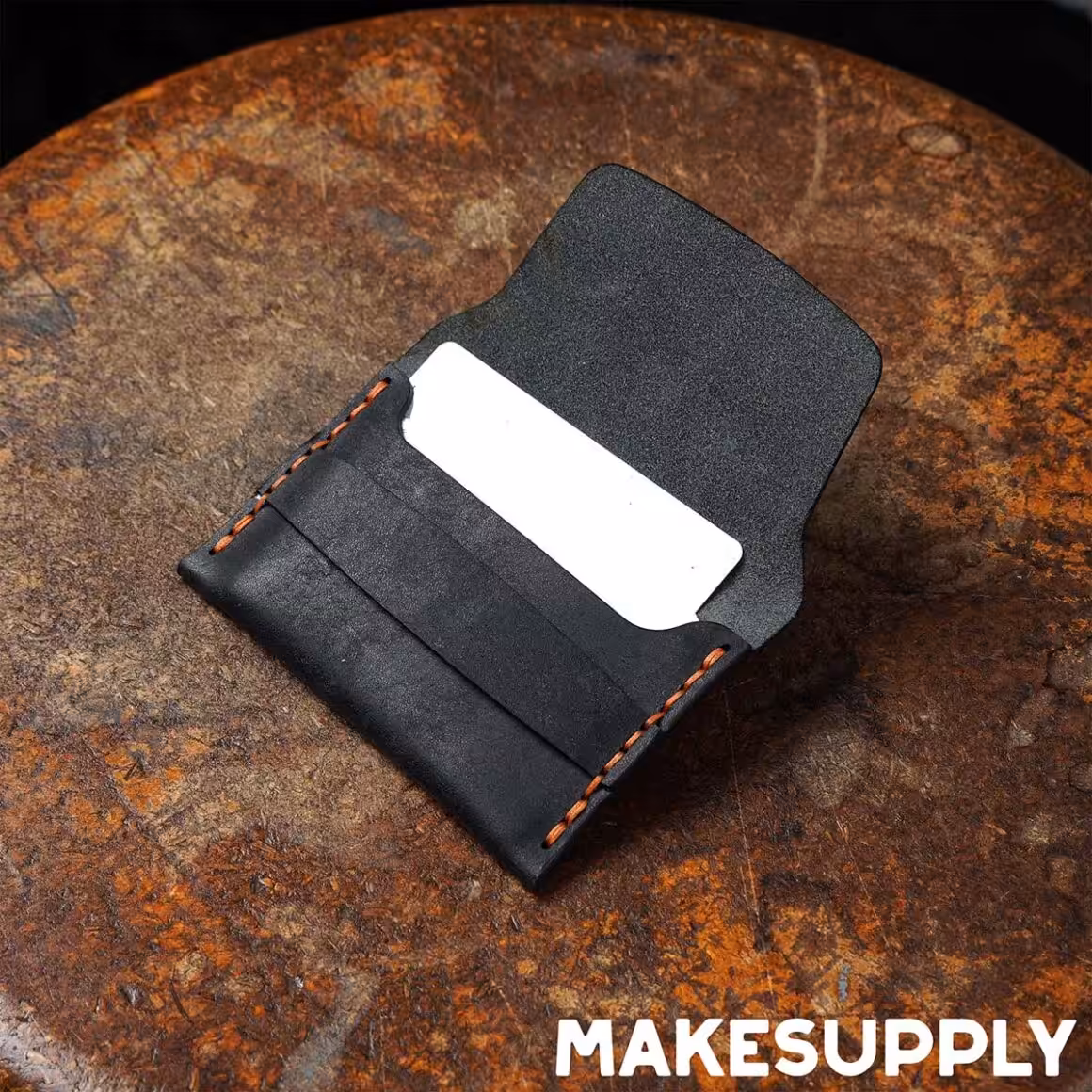 leather flap wallet pattern showing interior card pocket and folded construction