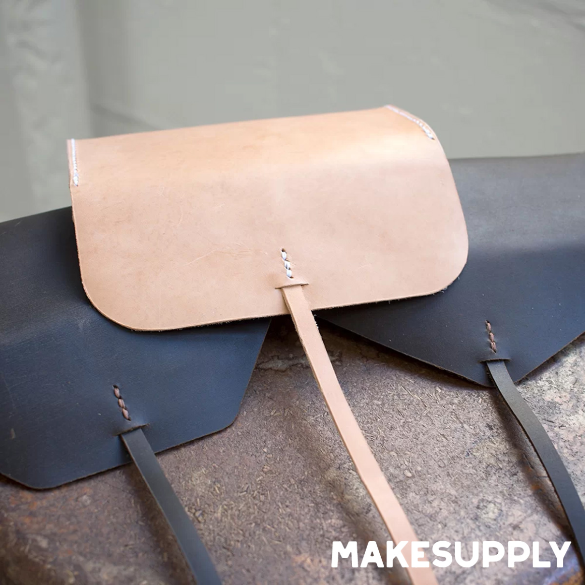 simple leather clutch with flap made from free PDF pattern