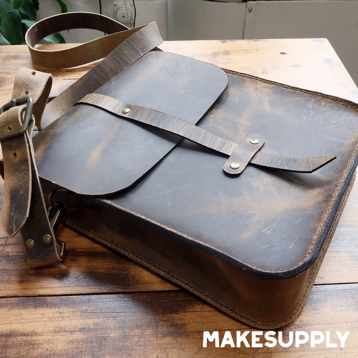 leather map case bag showing strap and closure from free pdf template