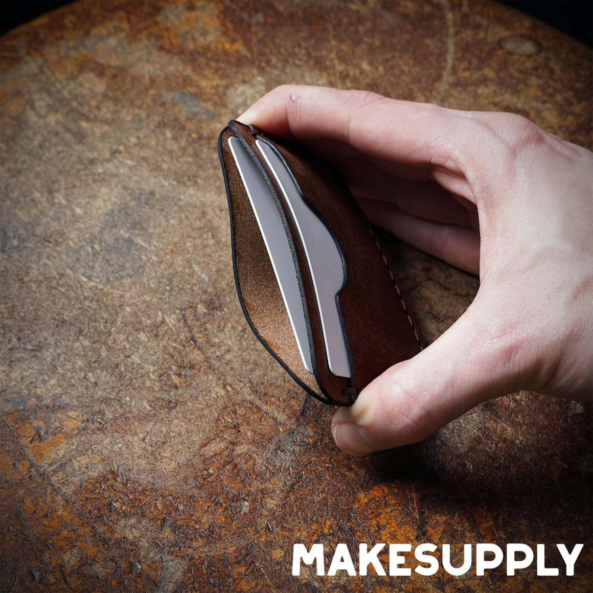 slim leather card holder showing pocket depth and card capacity