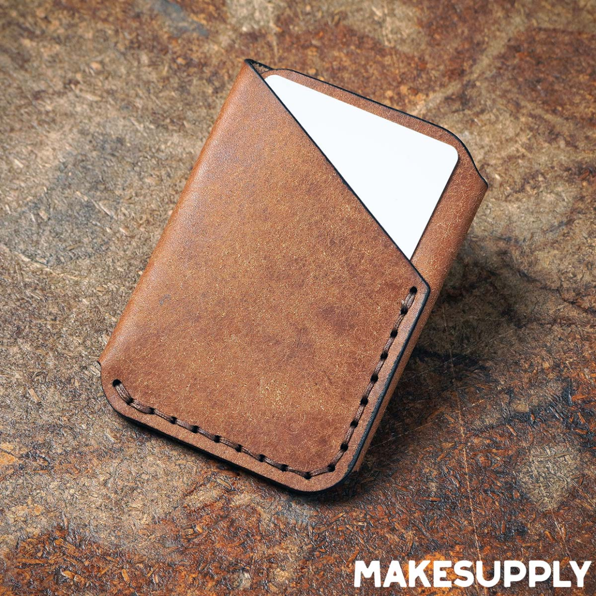 Simple leather wrap wallet design made using free printable PDF pattern