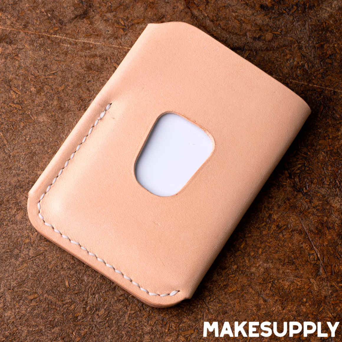 Back view of leather wrap wallet from free PDF pattern with thumb slot