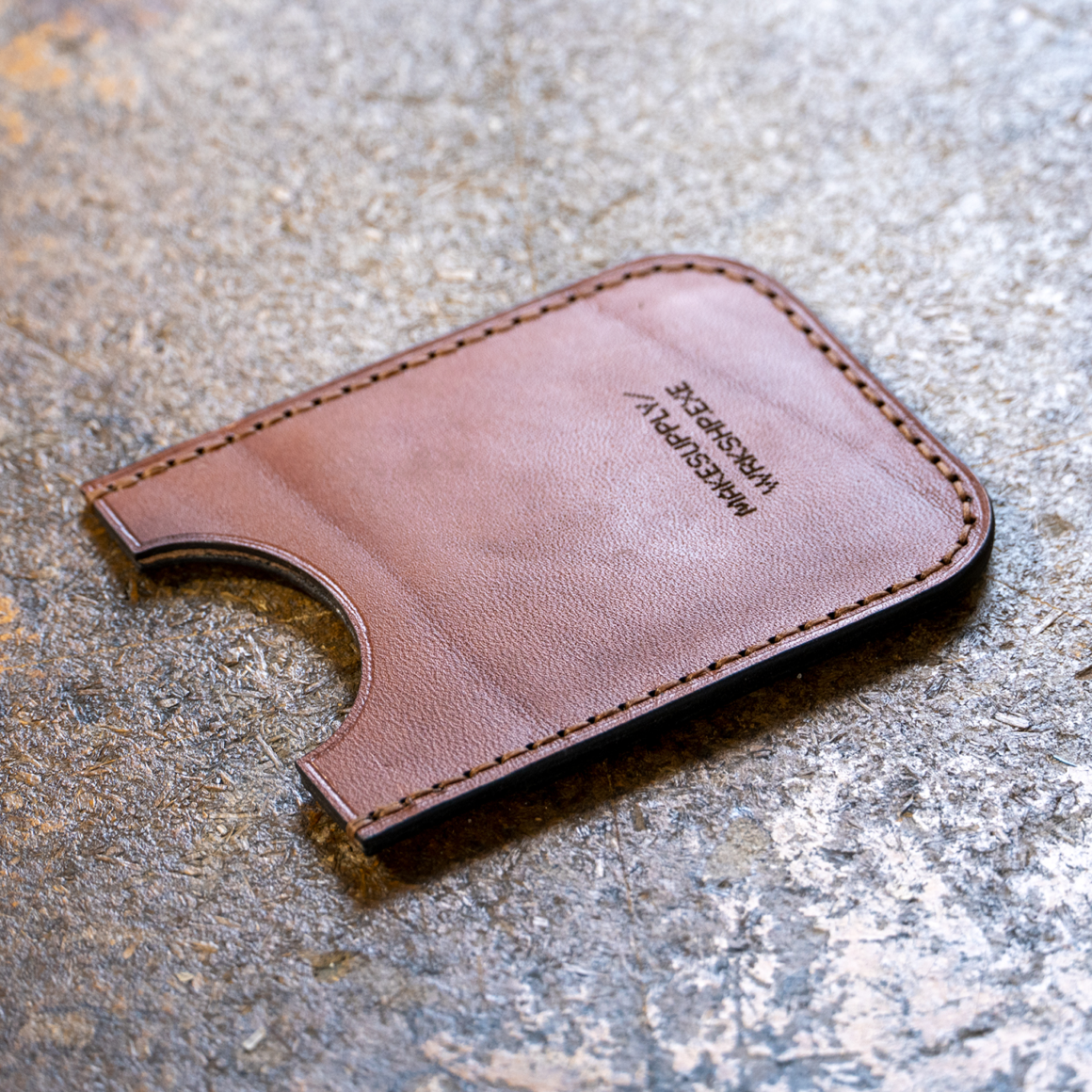 laser cut leather card wallet with engraved design 