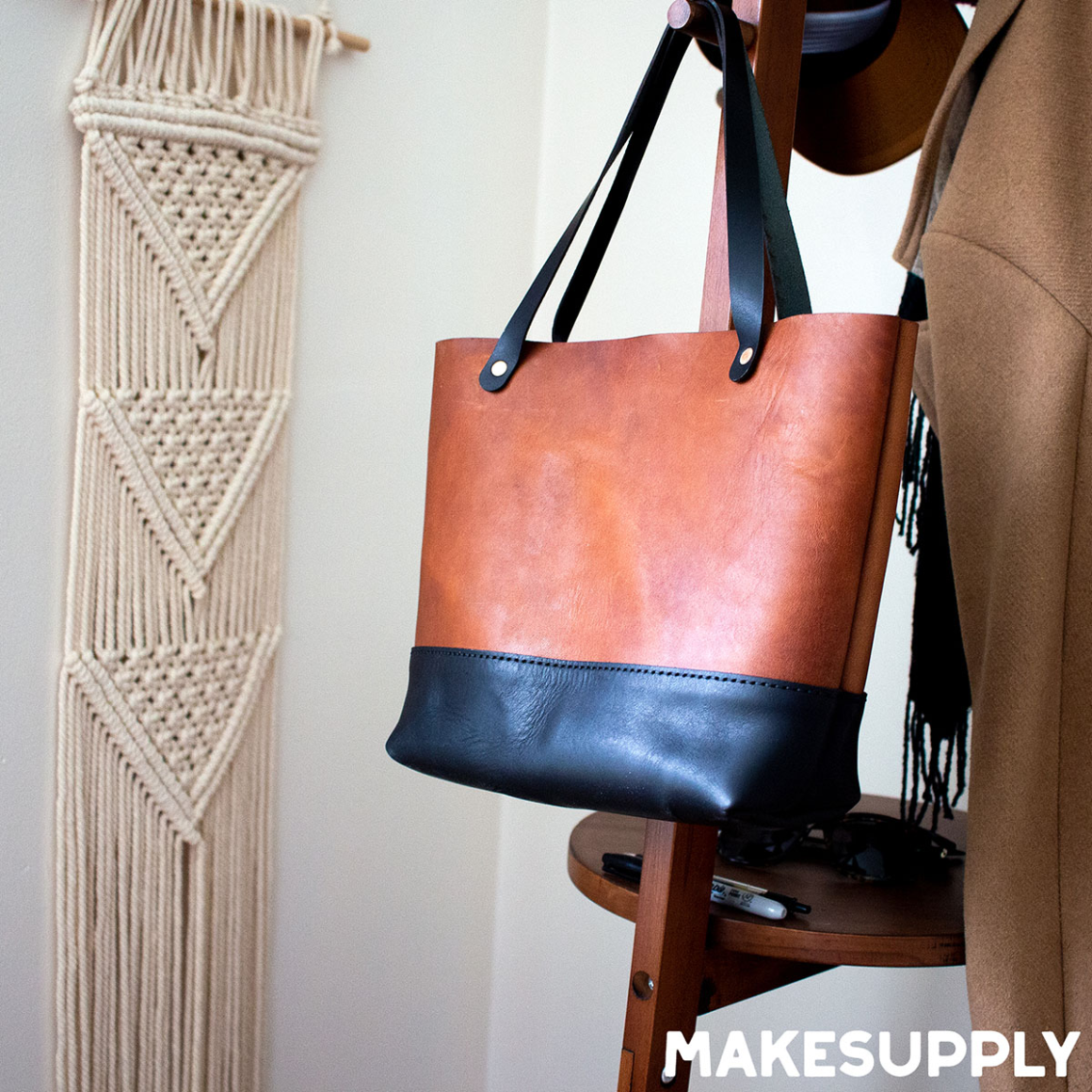 Leather tote bag made from free PDF pattern with riveted handles