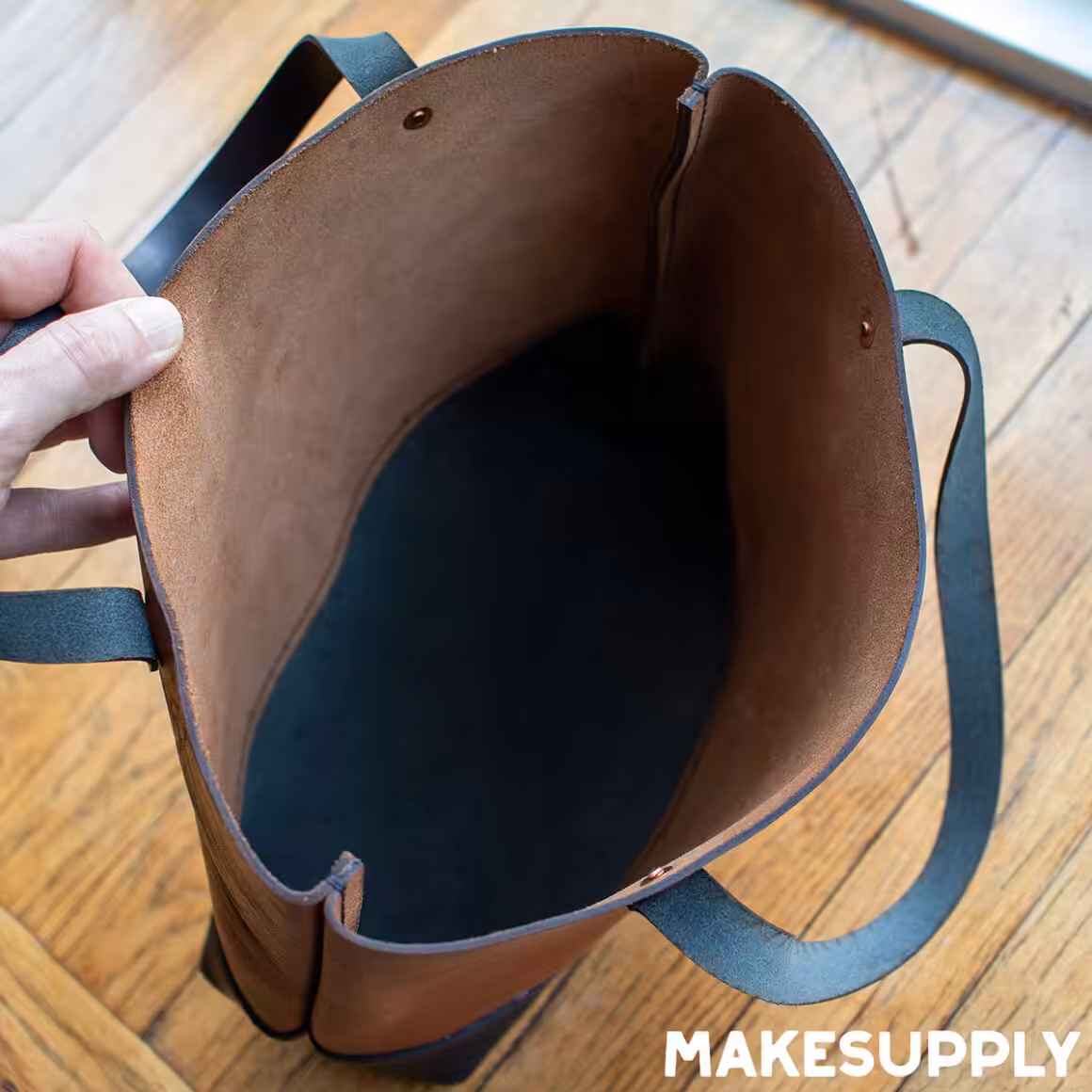 Inside view of leather tote bag showing unlined interior from PDF pattern