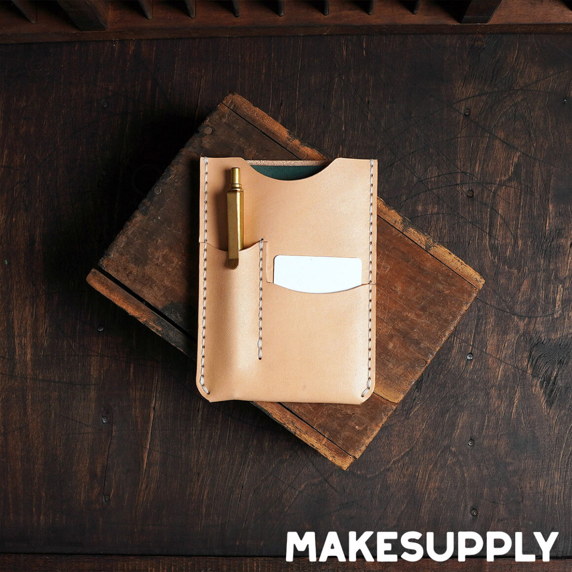 Leather Field Notes notebook cover with stitched edges, pen slot, and card pocket, compact everyday carry notebook case