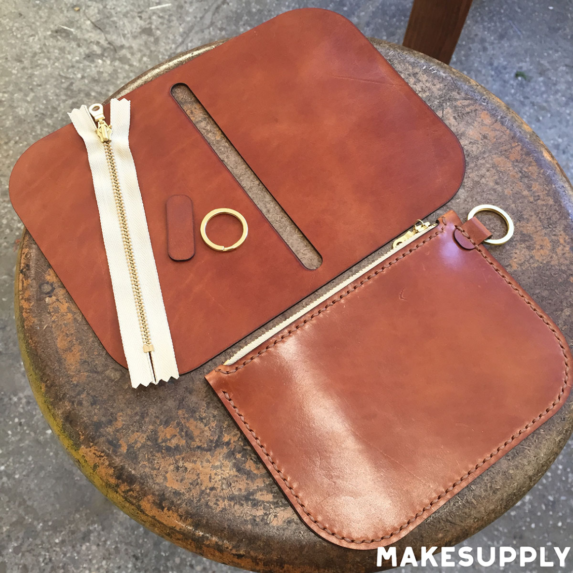 Free large leather zip pouch pattern with leather pieces zipper and hardware